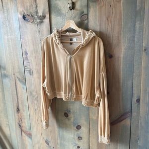 Cropped velour sweatshirt jacket with a jersey-lined drawstring hood with ties